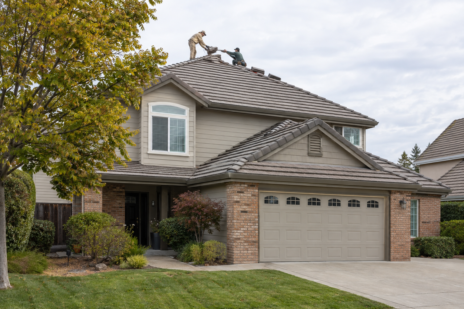 tile roofers on a Littleton home